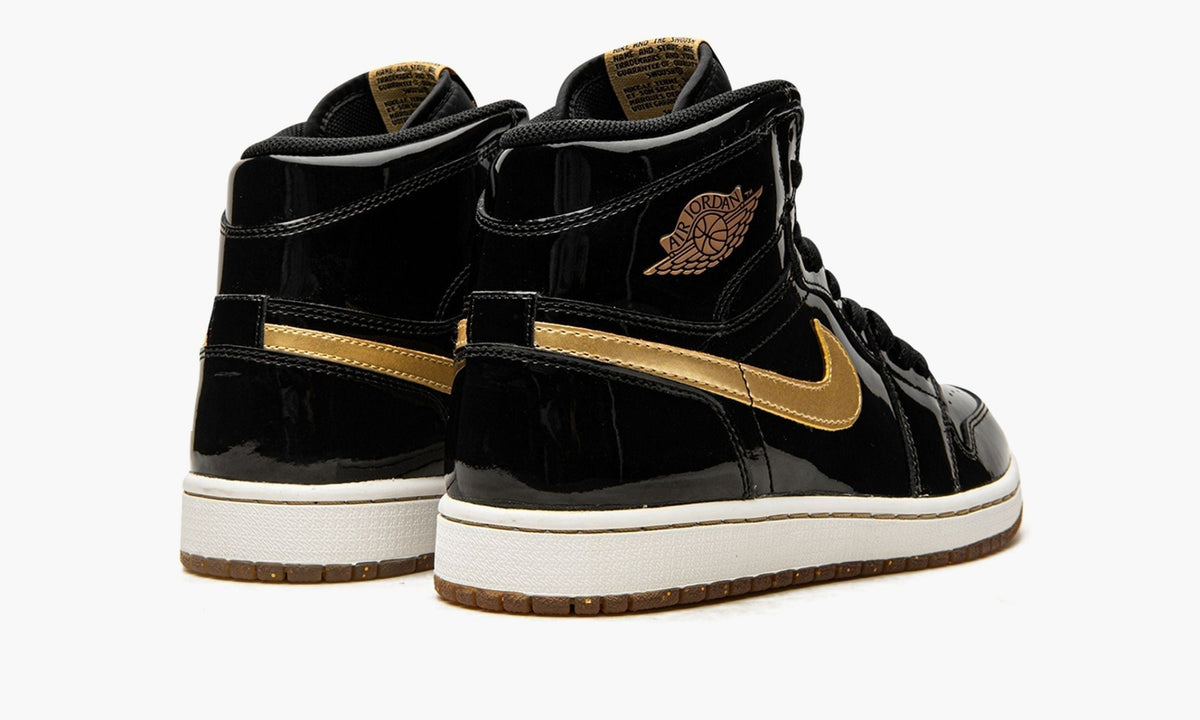 "Black/Metallic Gold" Air Jordan 1 Retro High OG - product image from the listing.