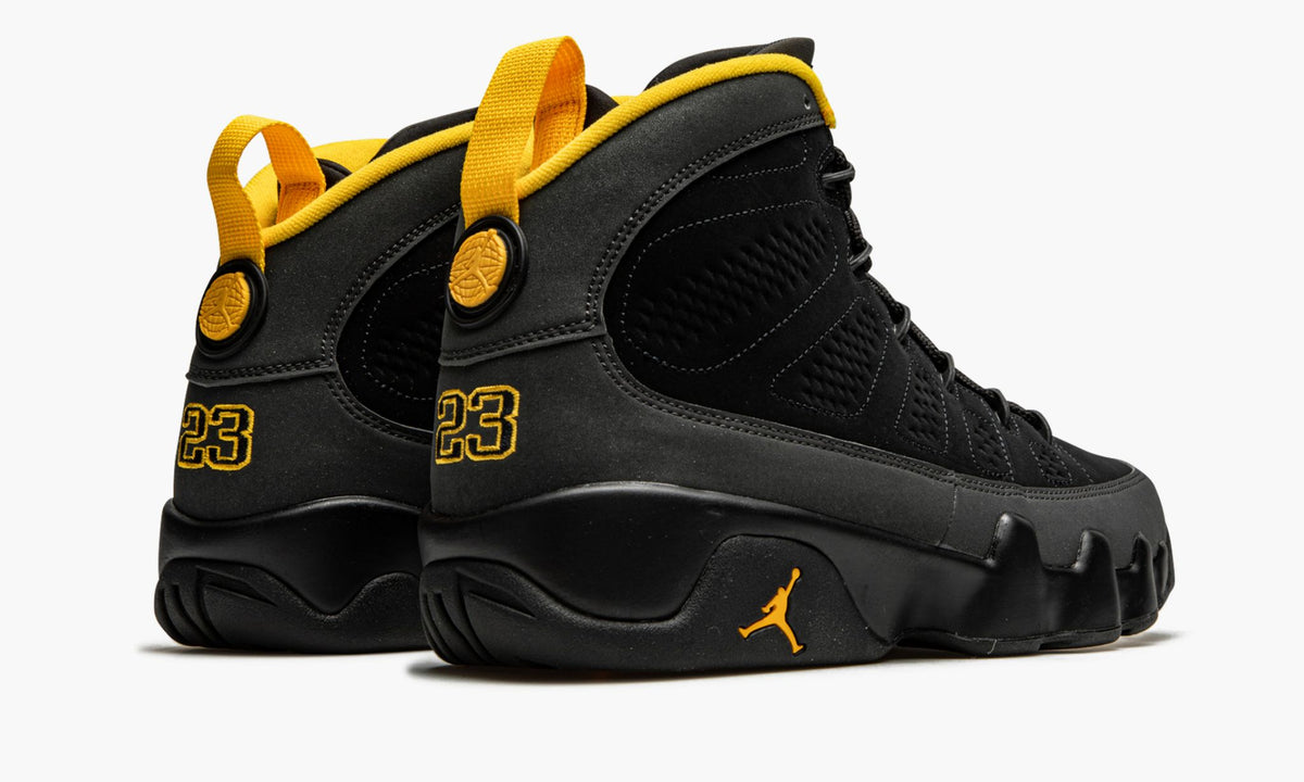 Air Jordan 9 Retro in University Gold - product image from the listing.