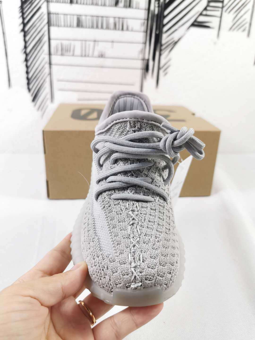 Light Grey and Coral Yeezy 350 V2 Kids Sneakers - product image from the listing.