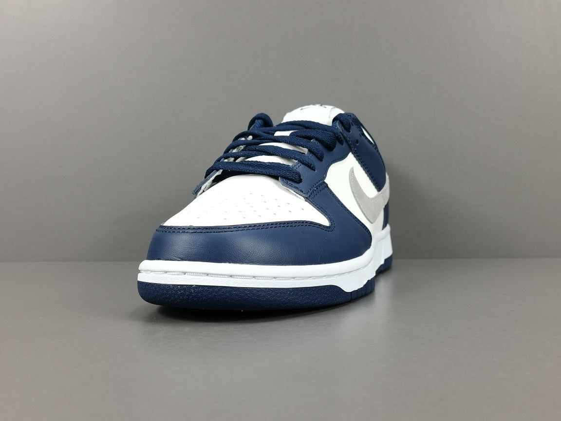 Nike Dunk Low Sneakers in Midnight Navy FD9749-400 - product image from the listing.
