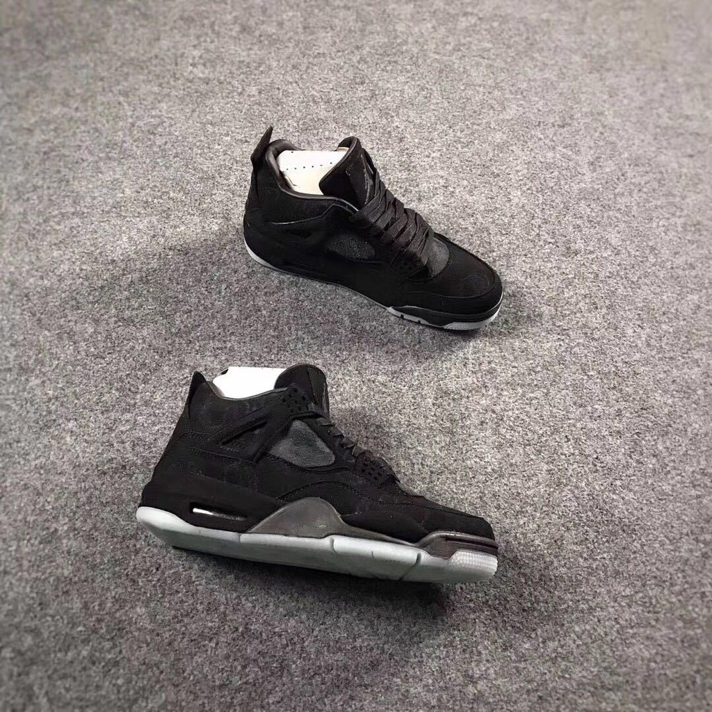 Jordan 4 KAWS Graffiti High-Top Sneakers in Black - product image from the listing.
