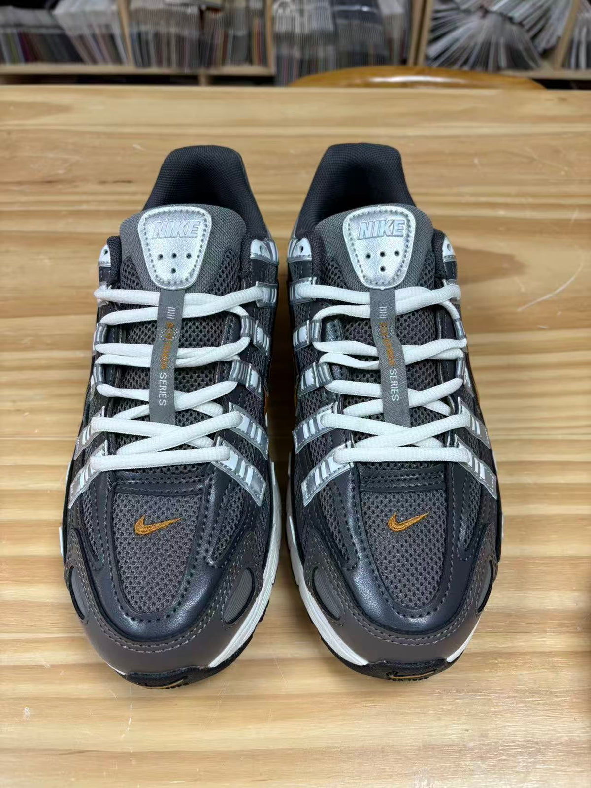 Nike P-6000 Sneakers CD6404-204 in Charcoal and White - product image from the listing.