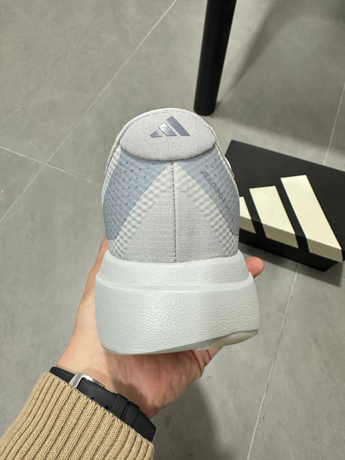 adidas Adizero Lightstrike Pro Running Shoes, in Gray and Pink - product image from the listing.