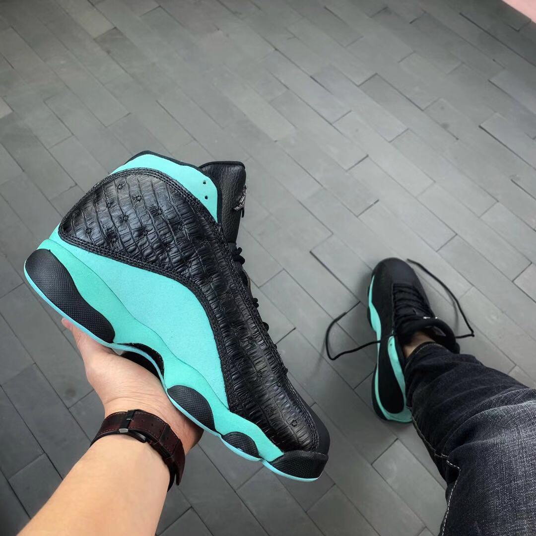 Air Jordan 13 Island Green Sneakers in Black Turquoise - product image from the listing.