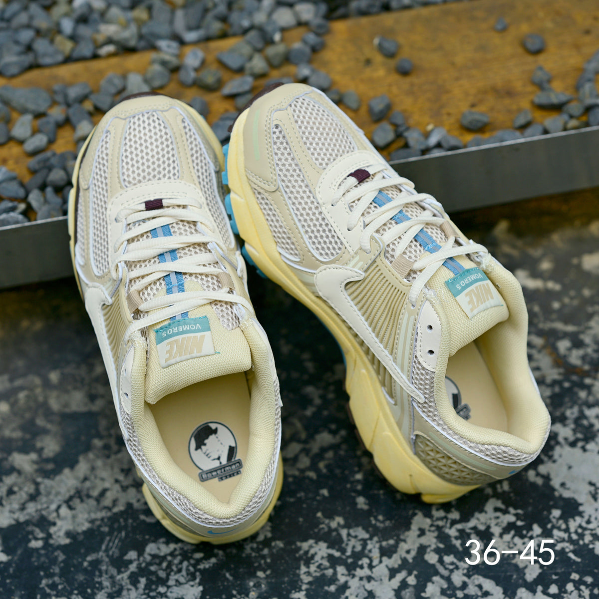 Pale Green and Blue Nike Air Zoom Vomero 5 Sneakers - product image from the listing.