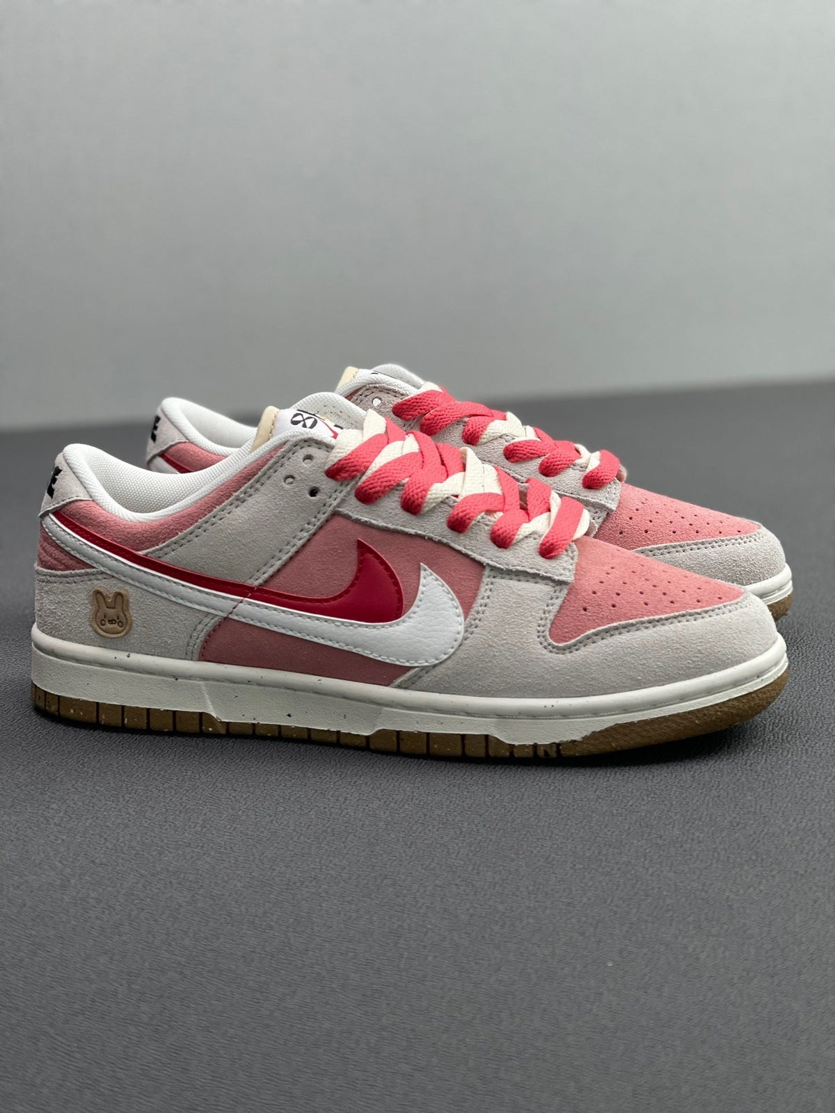 Nike Dunk Low SE Rabbit Year Sneakers in Pink White DO9457-117 - product image from the listing.