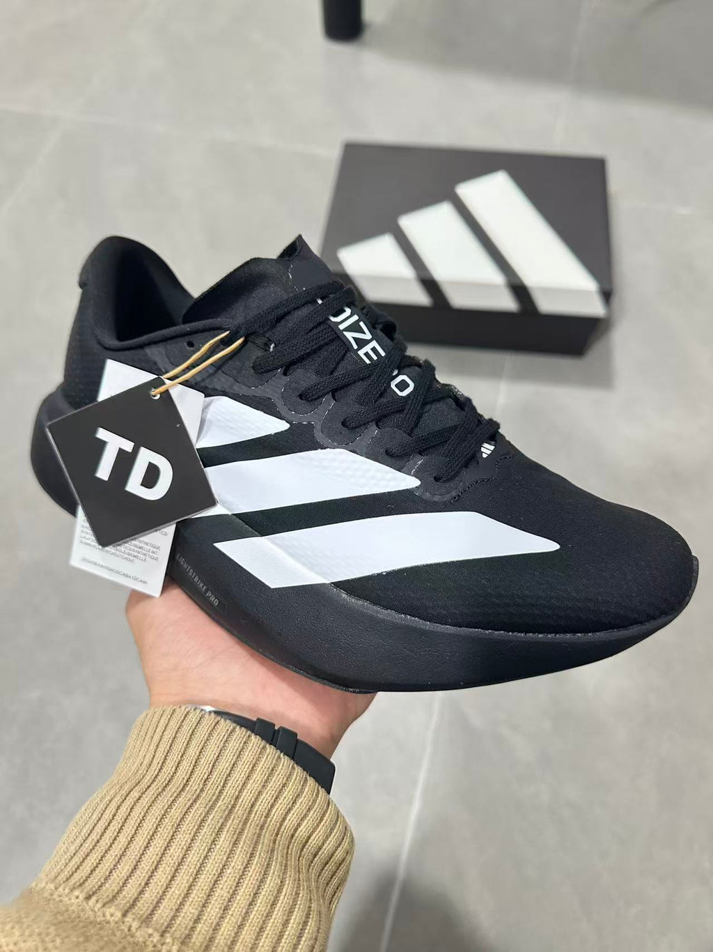 Adidas Lightstrike Pro Running Shoes in Black White KJ3595 - product image from the listing.