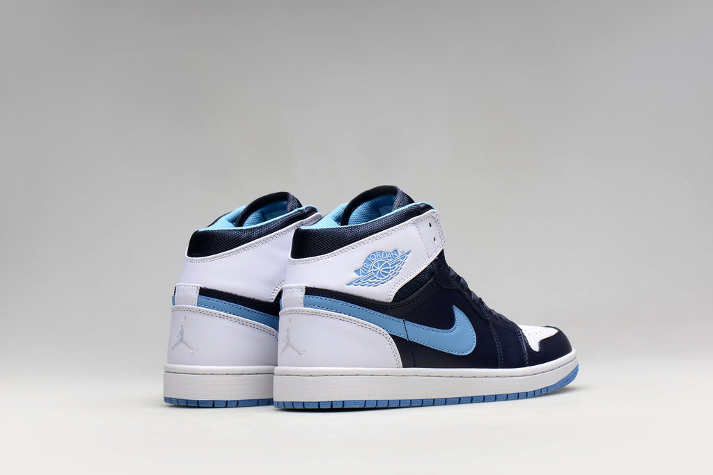 Blue and White Jordan 1 High Paul Edition Navy Sneakers - product image from the listing.