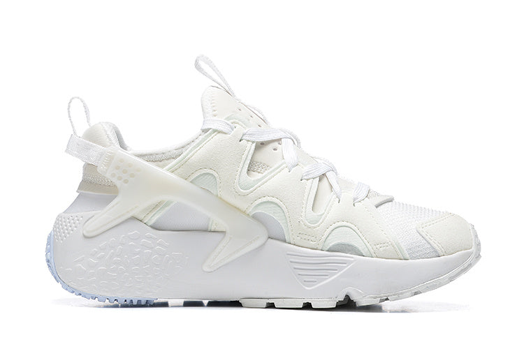 White and Pale Blue Nike Air Huarache Run Sneakers - product image from the listing.