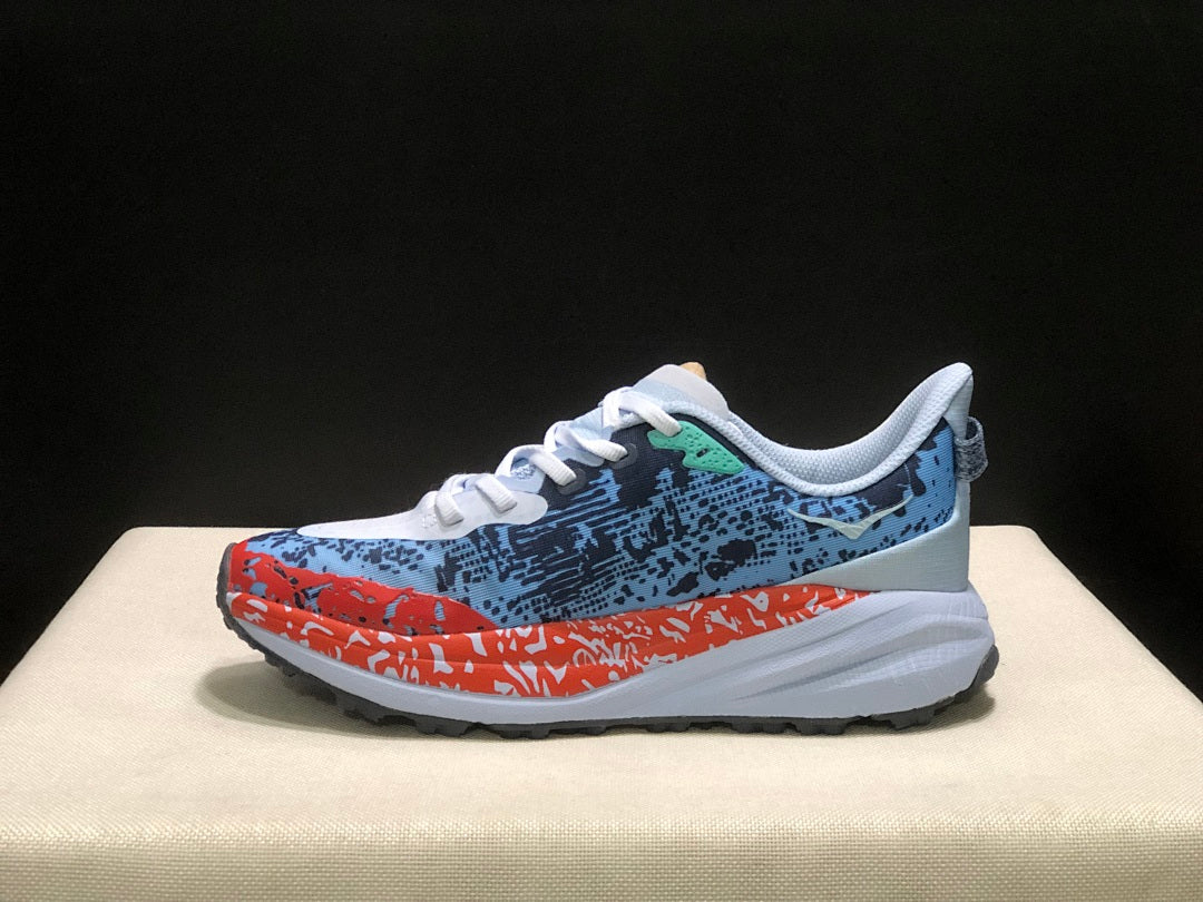 HOKA Speedgoat 6 Trail Running Shoes, in Blue and Orange - product image from the listing.