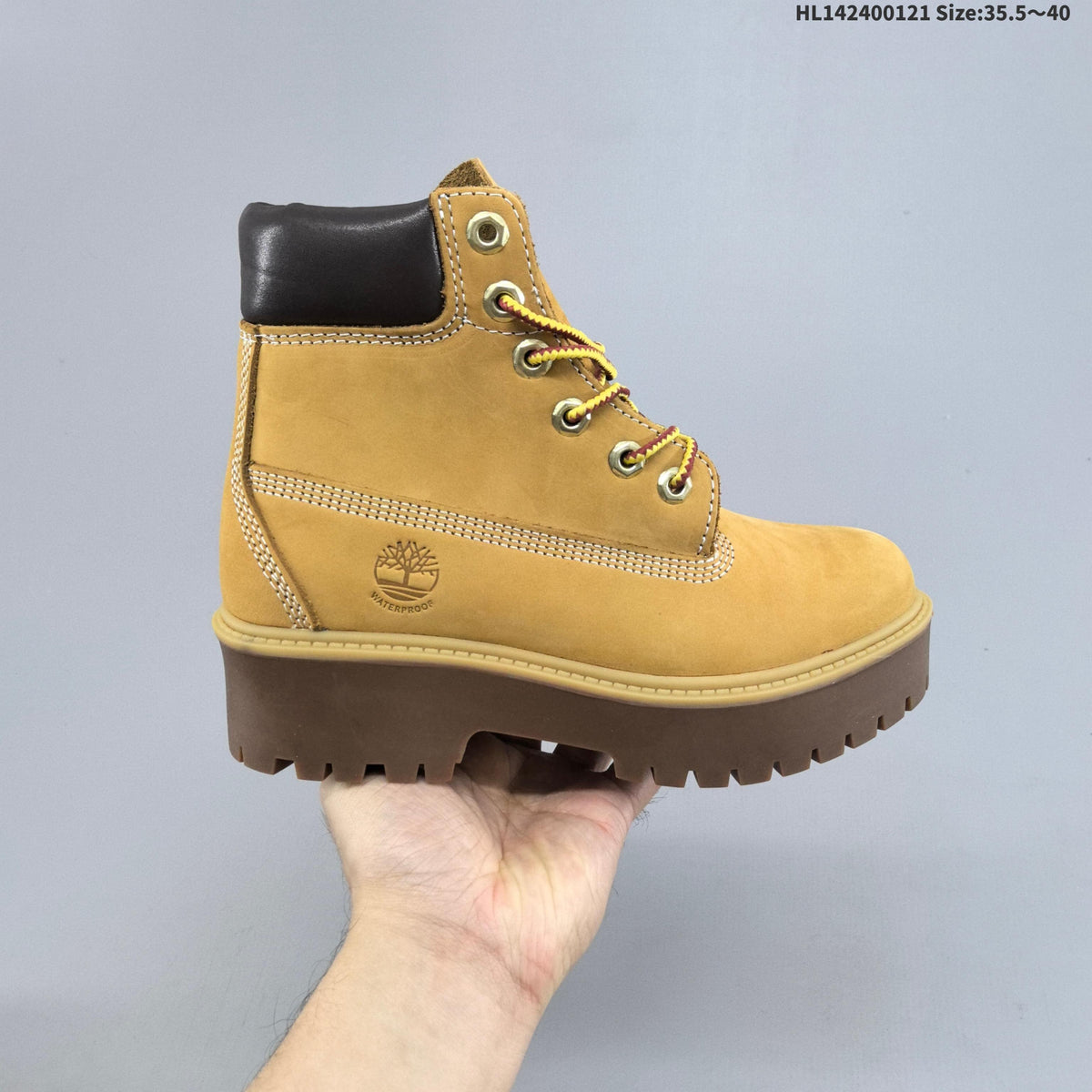 Mid-Top Lace-Up Boots in Wheat by Timberland - product image from the listing.