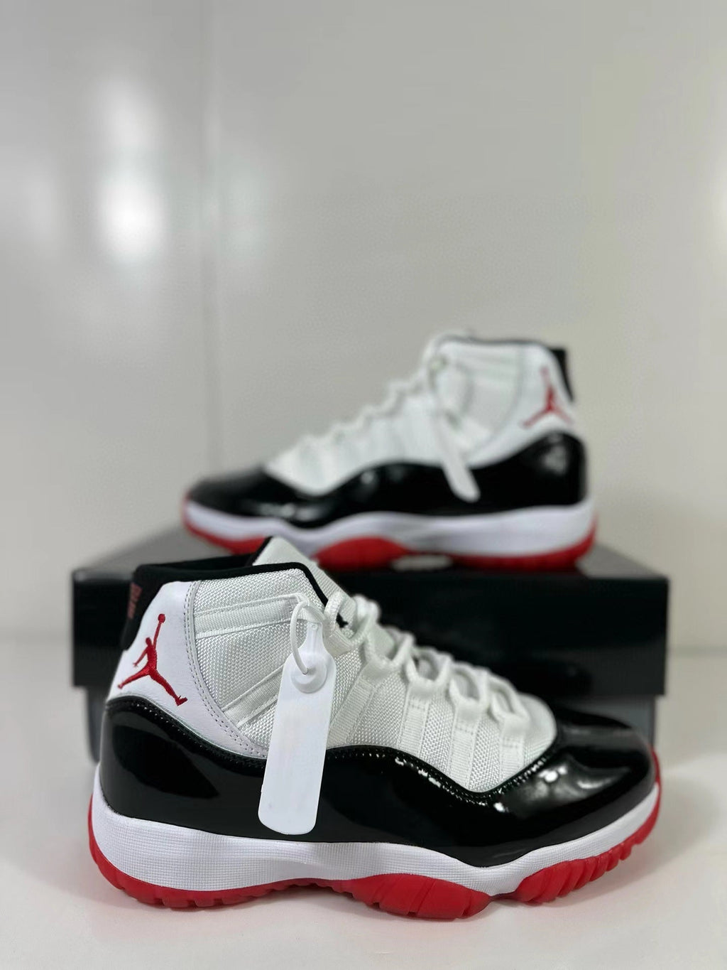 Air Jordan 11 Retro Concord Bred Sneakers CT8012-106 - product image from the listing.