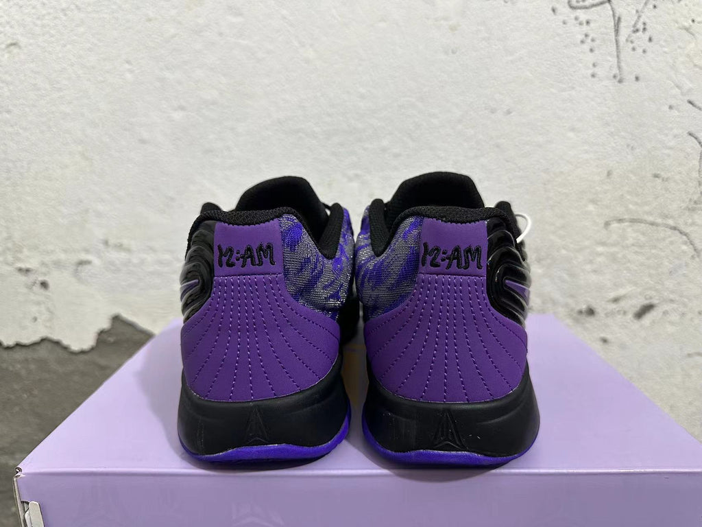 Nike Zoom Freak Basketball Shoes in Black Purple - product image from the listing.
