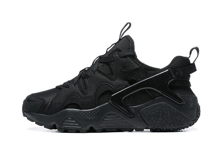 Nike Air Huarache Sneakers in Black - product image from the listing.