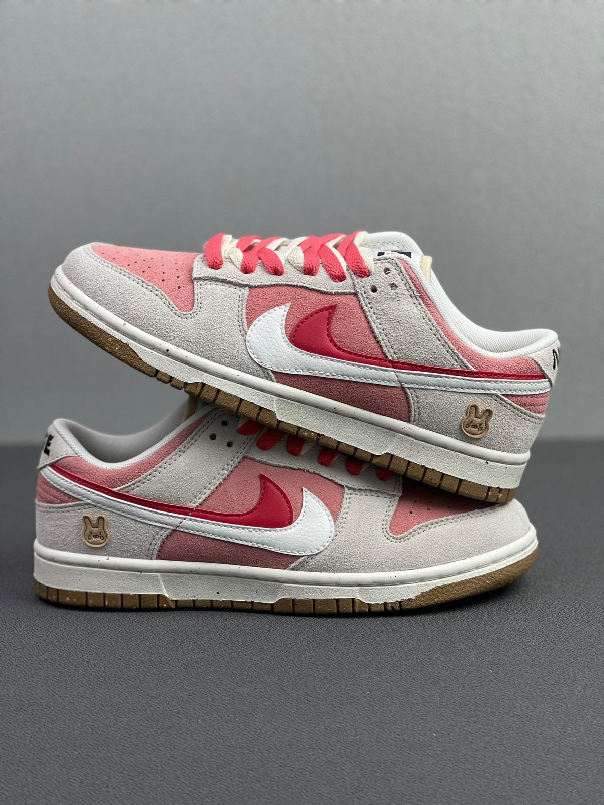 Nike Dunk Low SE Rabbit Year Sneakers in Pink White DO9457-117 - product image from the listing.