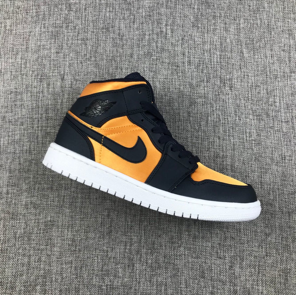 Air Jordan 1 Mid SE Sneakers in Black and Gold 852542-401 - product image from the listing.