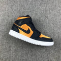Air Jordan 1 Mid SE Sneakers in Black and Gold 852542-401 - product image from the listing.