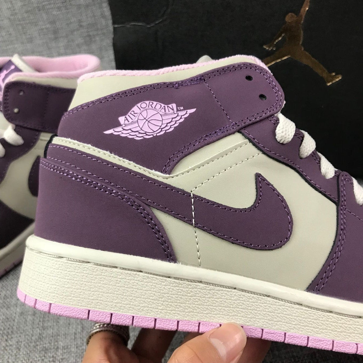 Air Jordan 1 Mid GS Sneakers in White Purple Pink - product image from the listing.