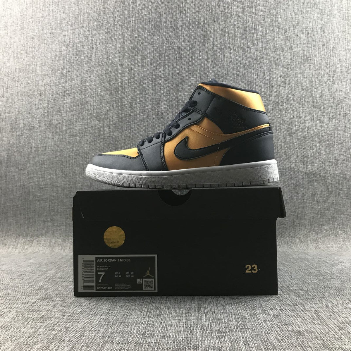 Air Jordan 1 Mid SE Sneakers in Black and Gold 852542-401 - product image from the listing.
