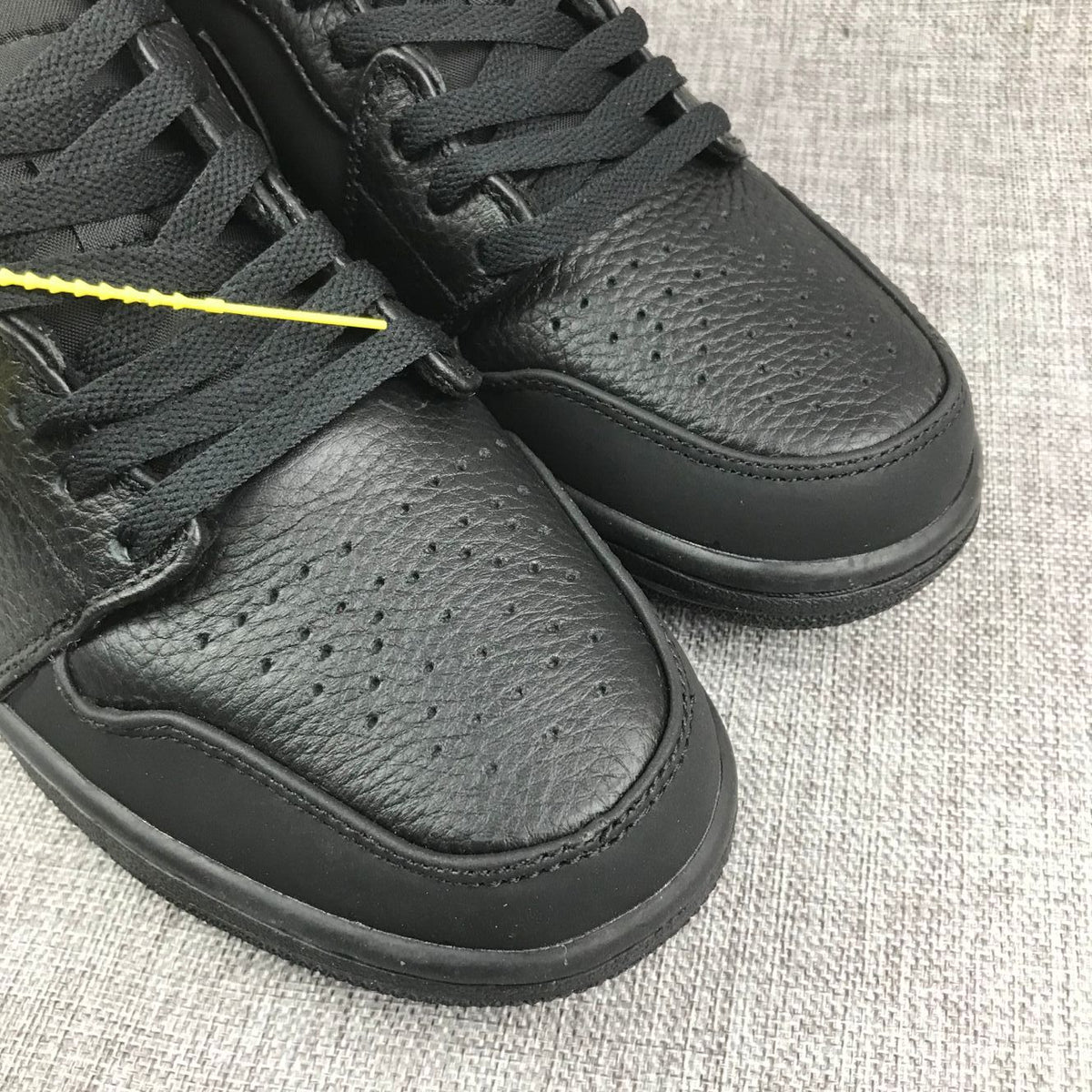 Air Jordan 1 Mid Sneakers, in Black - product image from the listing.