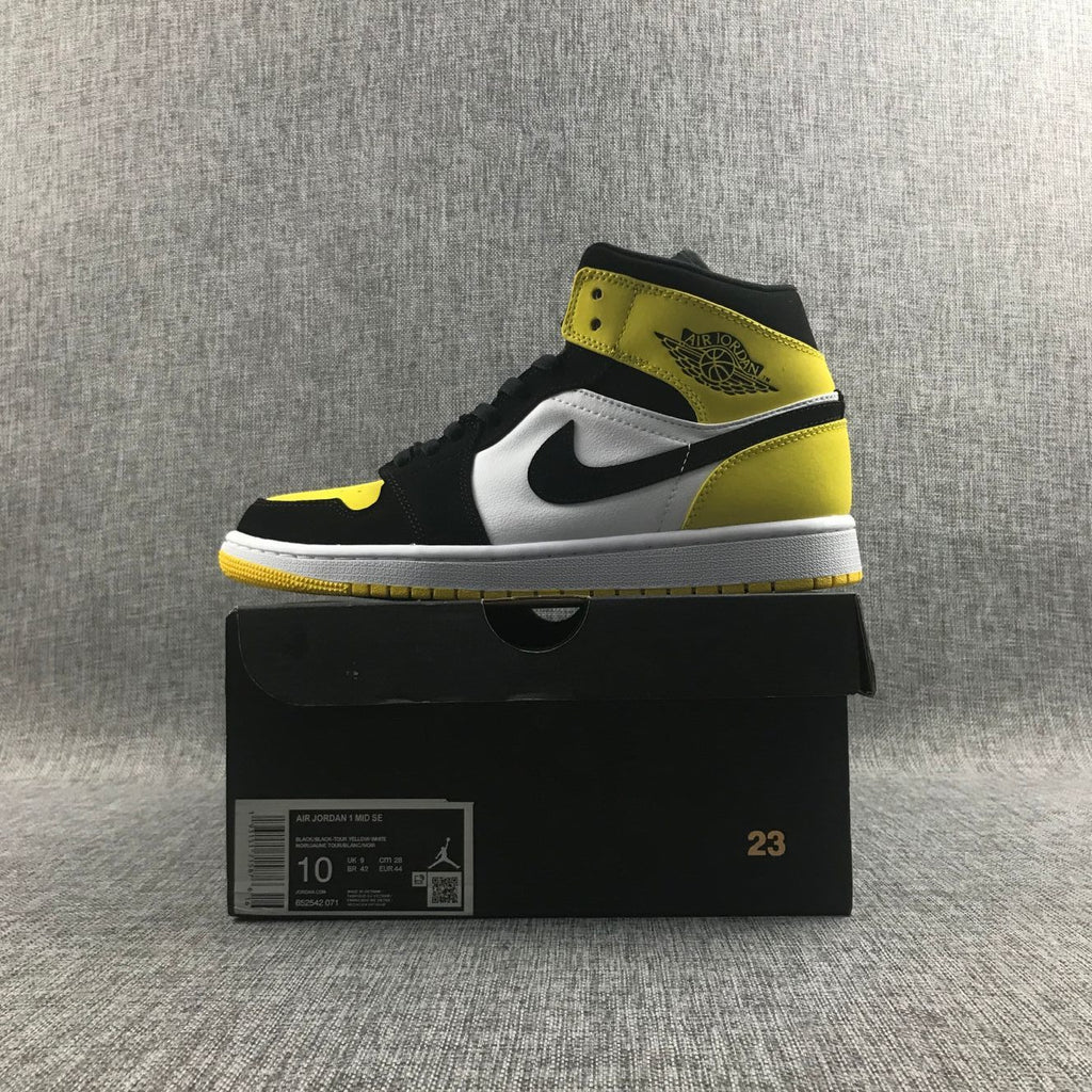 Black Yellow Toe Sneakers - Air Jordan 1 Mid SE 852542-071 - product image from the listing.