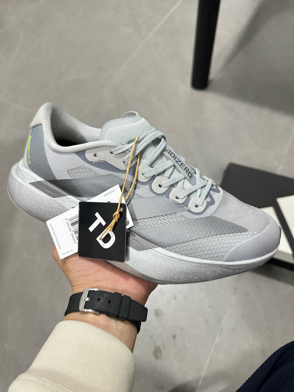 adidas Adizero Evo SL Running Shoes in Light Grey - product image from the listing.