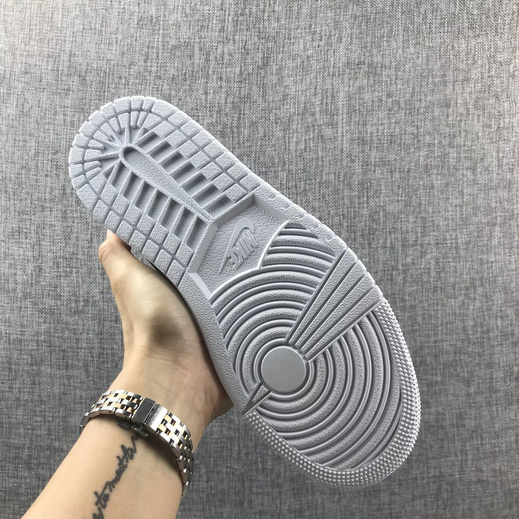 Air Jordan 1 Mid Sneakers in Black and White 852542-016 - product image from the listing.