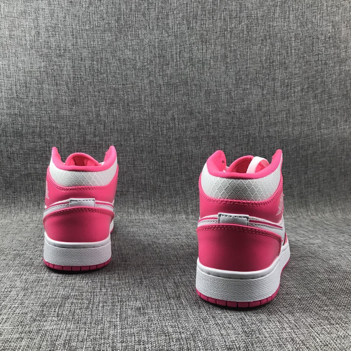 Air Jordan 1 Mid Sneakers in White Pink 555112-611 - product image from the listing.