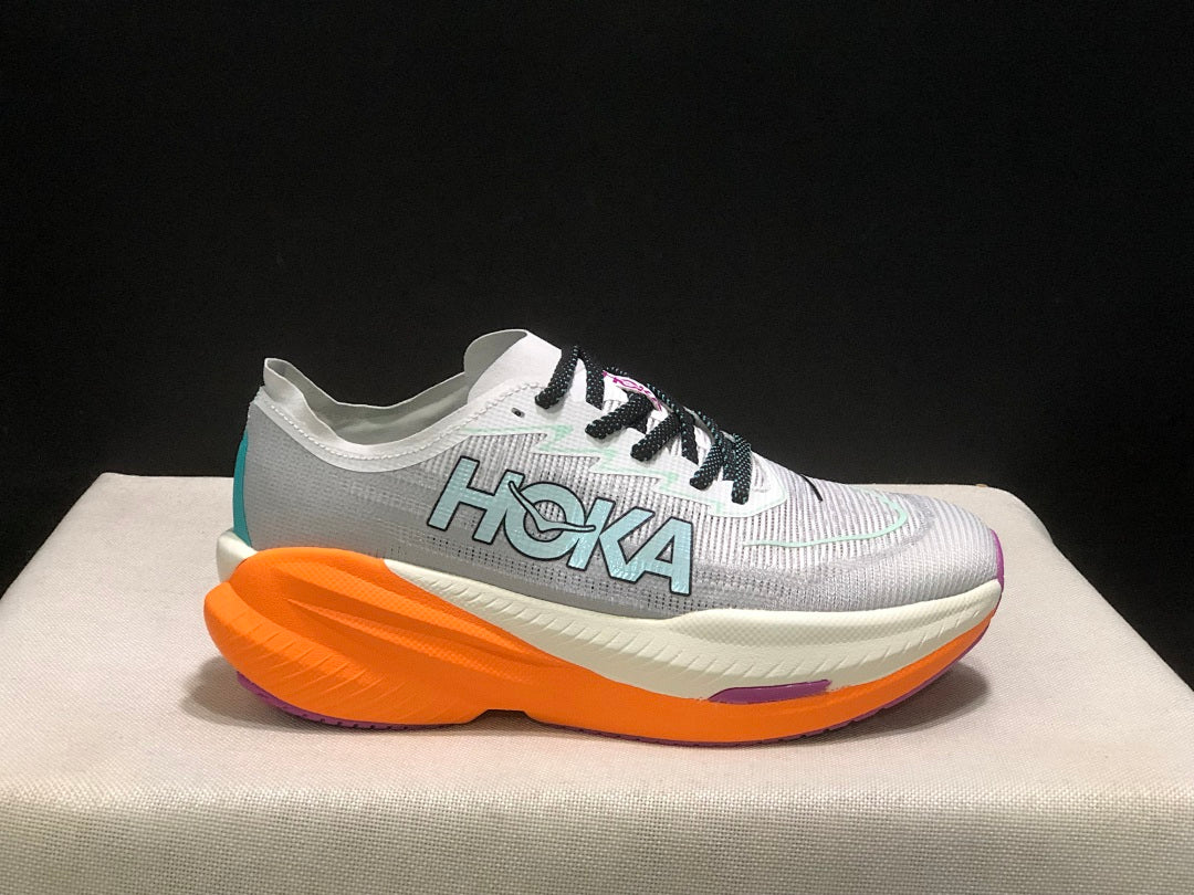 Gray and Orange HOKA Mach X 2 Running Shoes - product image from the listing.