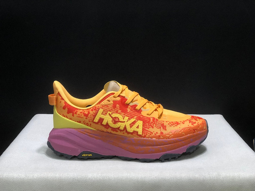 HOKA Speedgoat 6 Trail Running Shoes, in Orange and Yellow - product image from the listing.