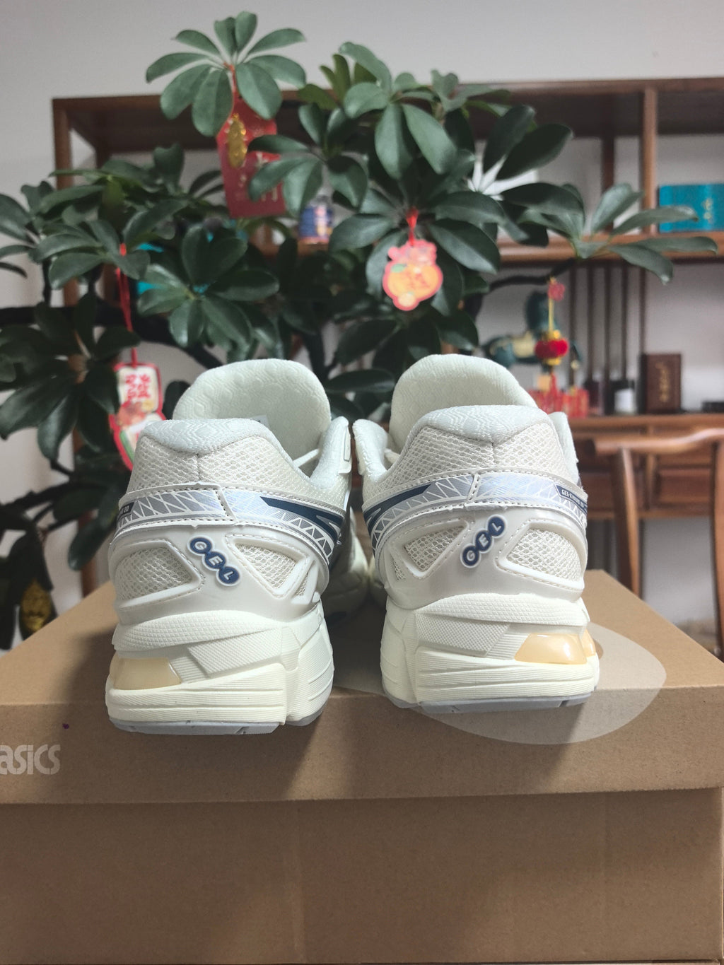 ASICS GEL-NANDI 9 Sneakers in Cream and Blue - product image from the listing.