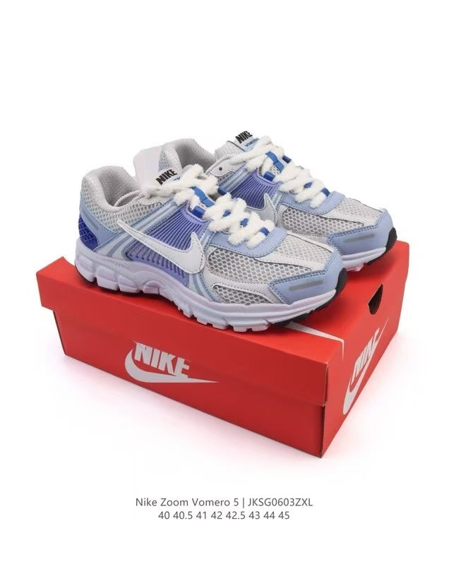 Nike Zoom Vomero 5 Sneakers in Light Blue JKG603ZXL - product image from the listing.
