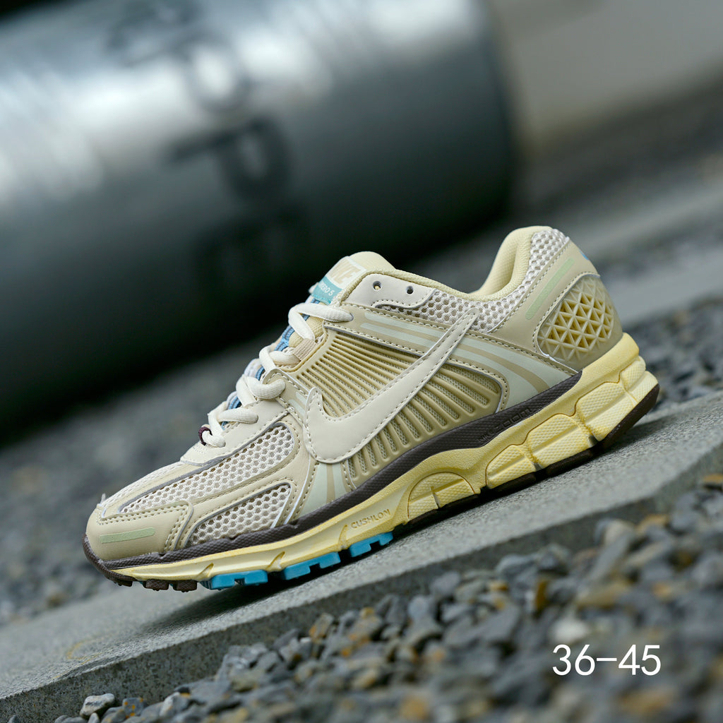 Pale Green and Blue Nike Air Zoom Vomero 5 Sneakers - product image from the listing.