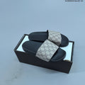 HL58500523 Monogram Slide Sandals by Gucci - product image from the listing.