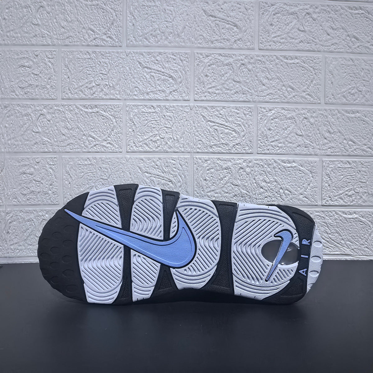 Nike Air More Uptempo Panda Sneakers in Black and White - product image from the listing.