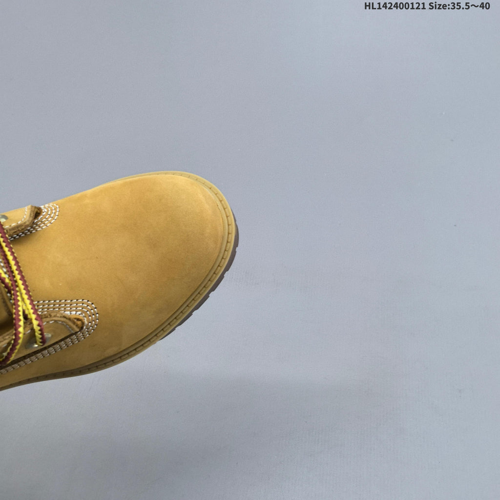 Mid-Top Lace-Up Boots in Wheat by Timberland - product image from the listing.