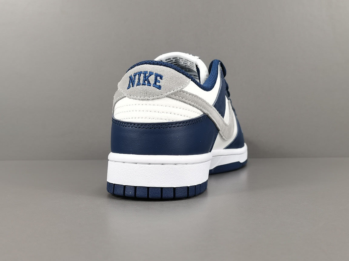 Nike Dunk Low Sneakers in Midnight Navy FD9749-400 - product image from the listing.