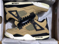 Jordan 4 Retro Sneakers in Tan Black - product image from the listing.