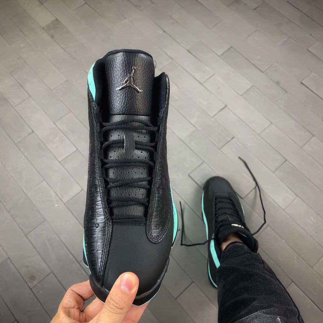Air Jordan 13 Island Green Sneakers in Black Turquoise - product image from the listing.