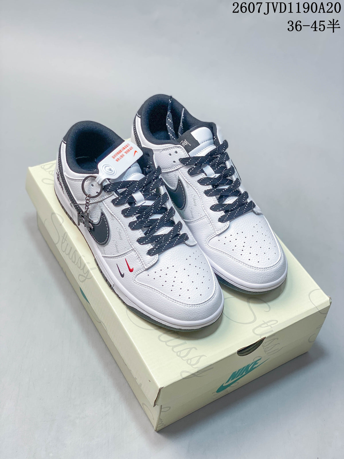 Nike SB Dunk Low Stüssy Sneakers in White Black - product image from the listing.