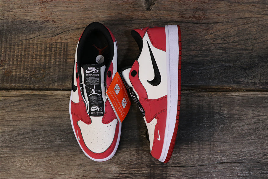 Nike Air Jordan 1 Low Sneakers in Red White Black - product image from the listing.