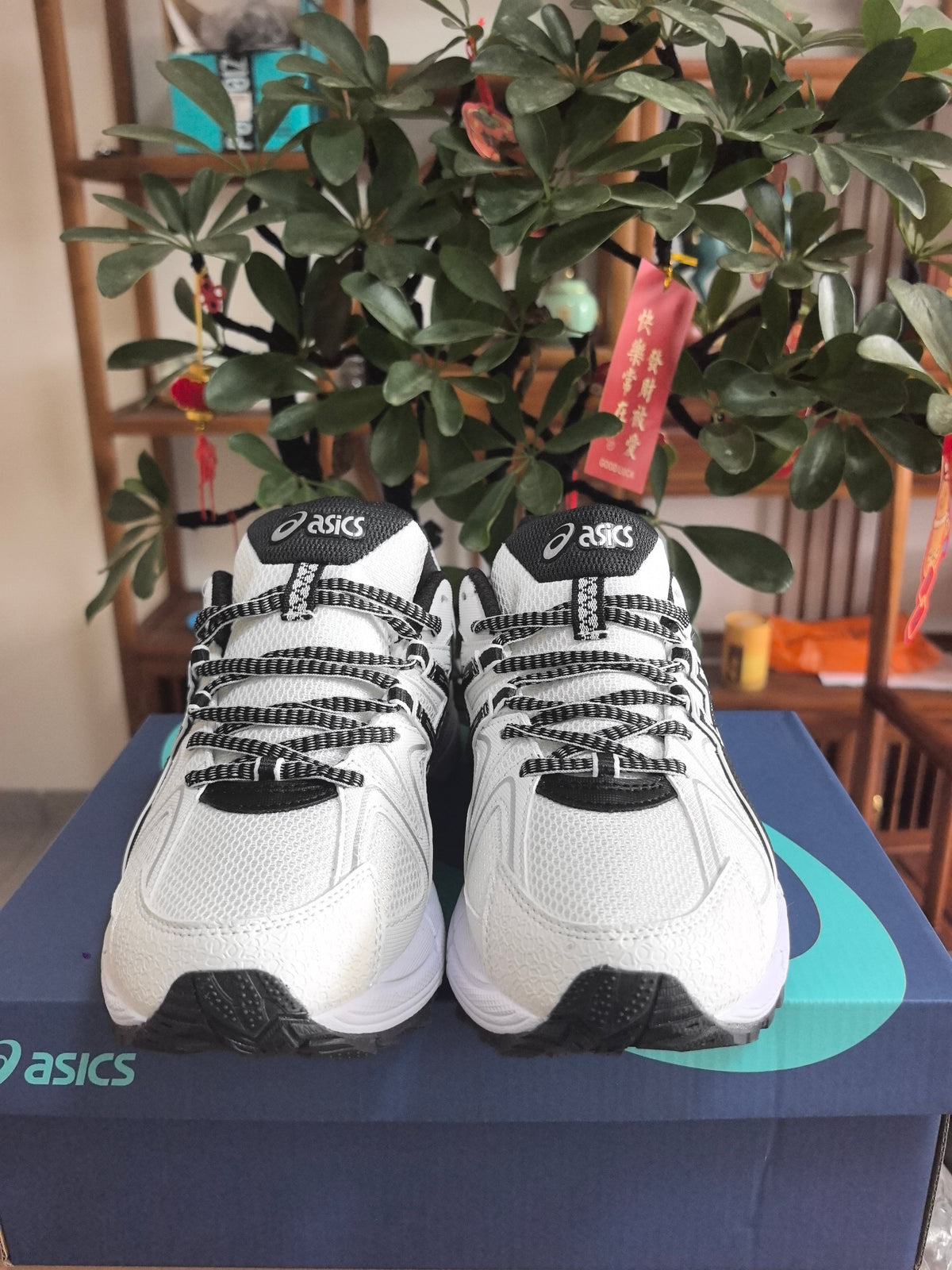 ASICS K3 Sneakers in Black and White - product image from the listing.