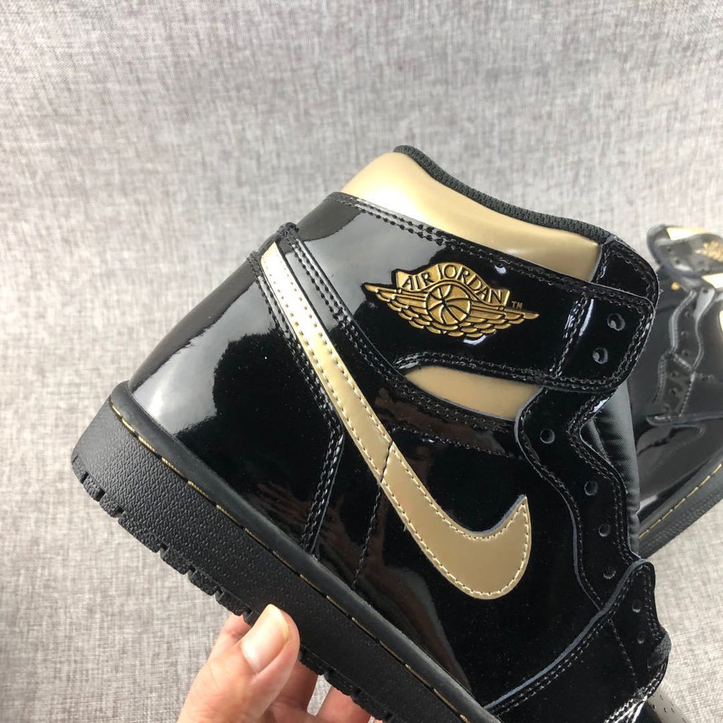 Air Jordan 1 High OG Black Gold Sneakers 555088-032 - product image from the listing.