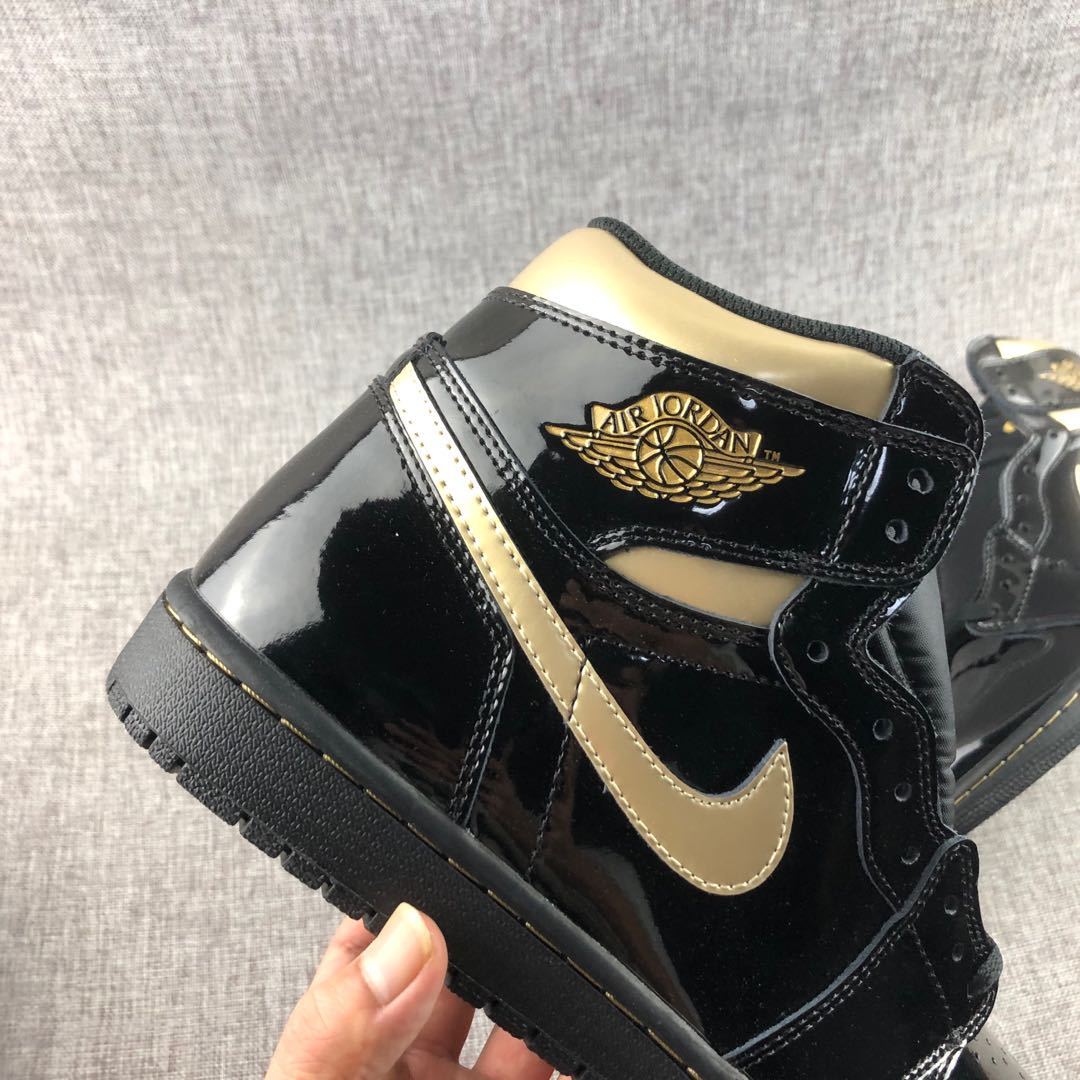 Air Jordan 1 High OG Black Gold Sneakers 555088-032 - product image from the listing.