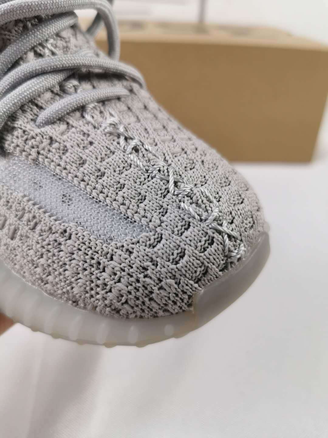 Light Grey and Coral Yeezy 350 V2 Kids Sneakers - product image from the listing.