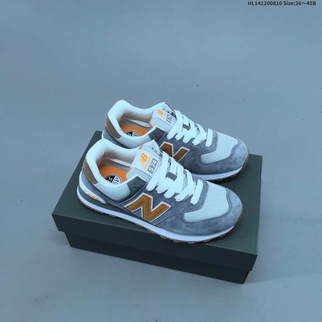 New Balance 574 Retro Sneakers in Black, Grey or in Cream - product image from the listing.