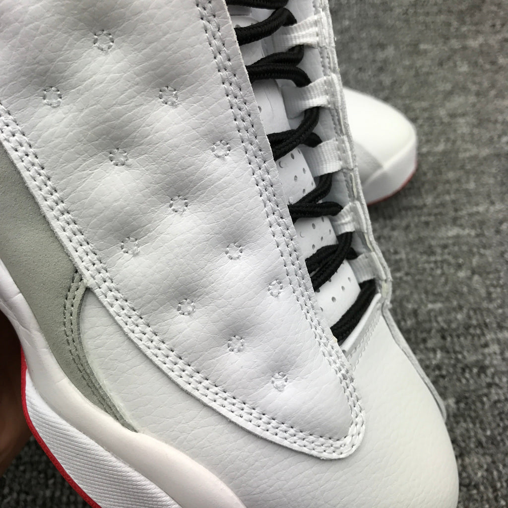 Air Jordan 13 High-Top Sneakers in White and Red - product image from the listing.