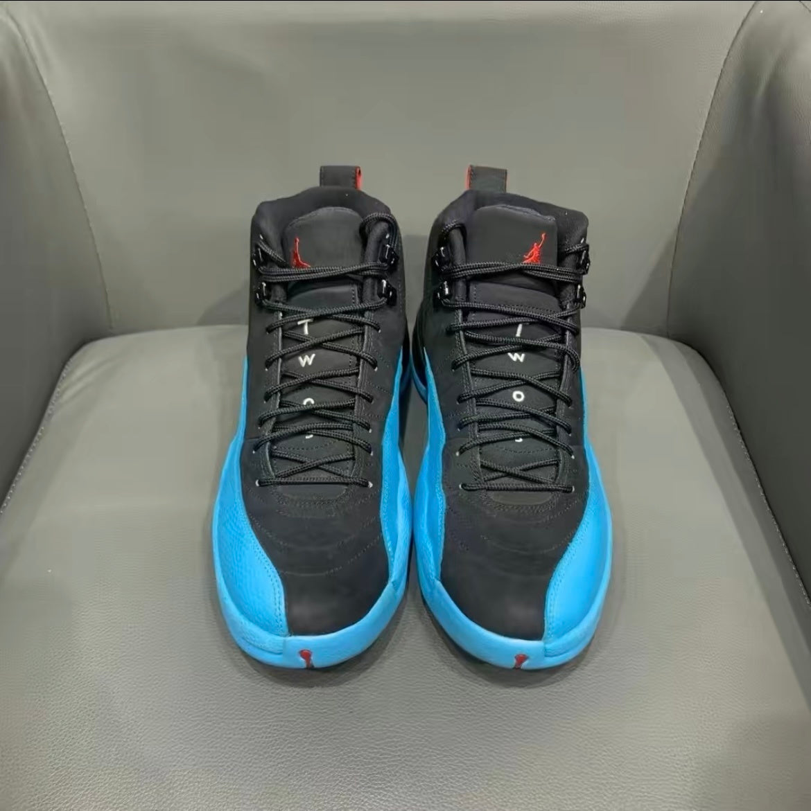 Air Jordan 12 Retro Gamma High-Top Sneakers in Blue 130690-027 - product image from the listing.