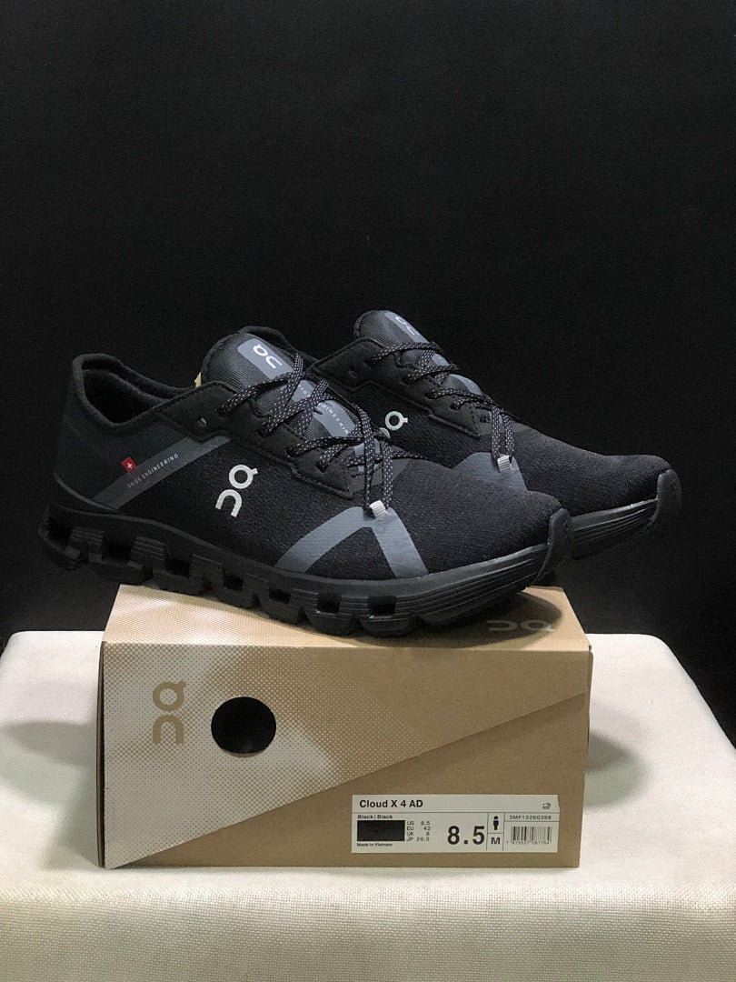 On Cloud X 4 AD Sneakers in Black - product image from the listing.