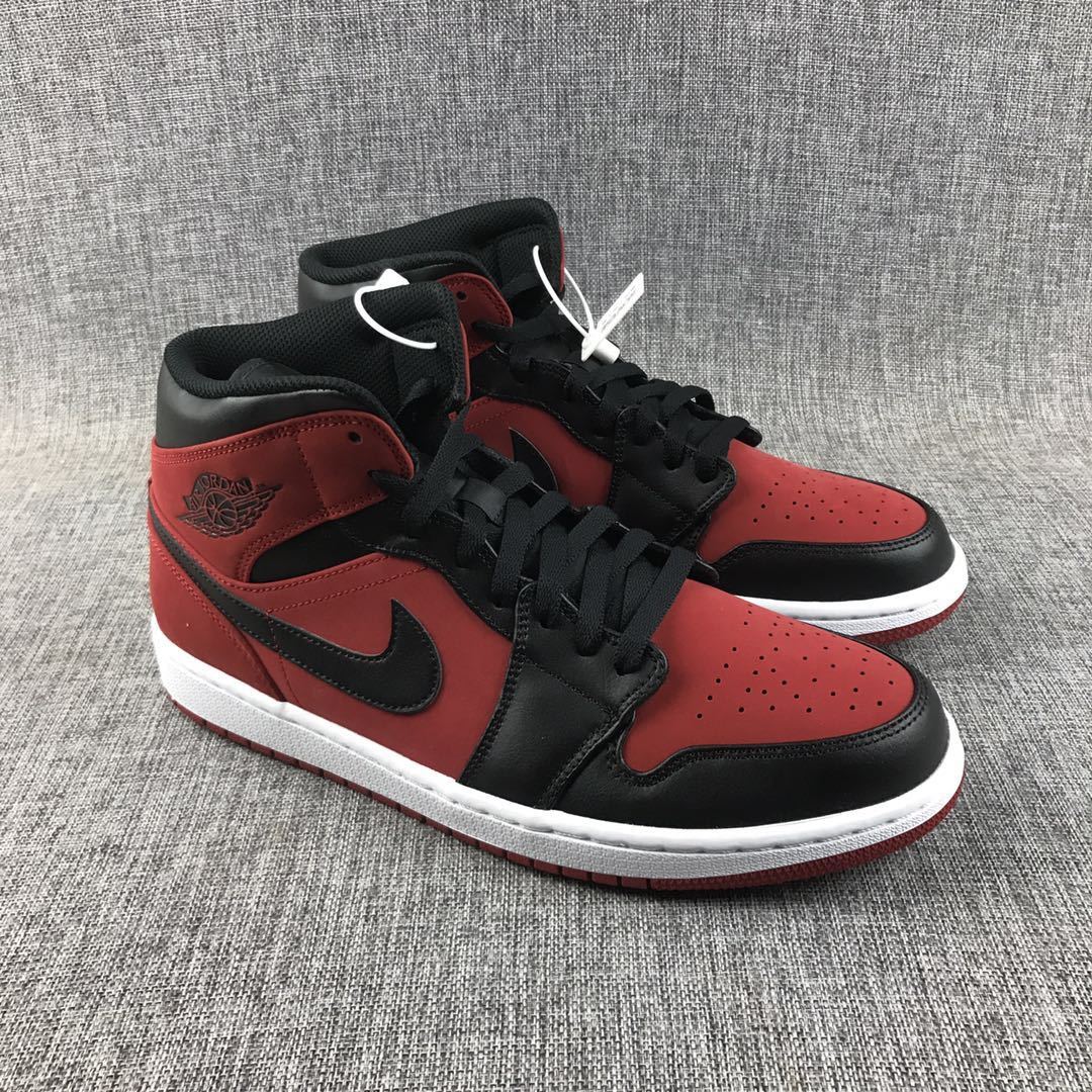 Air Jordan 1 Mid Sneakers in Red, in Black and White - product image from the listing.